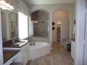 a spacious bathroom with a bathtub