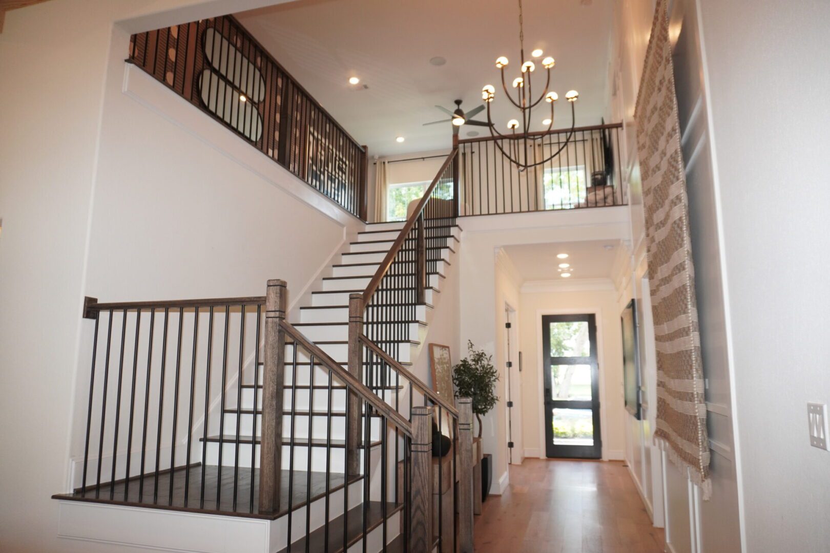A large open staircase in the middle of a house.